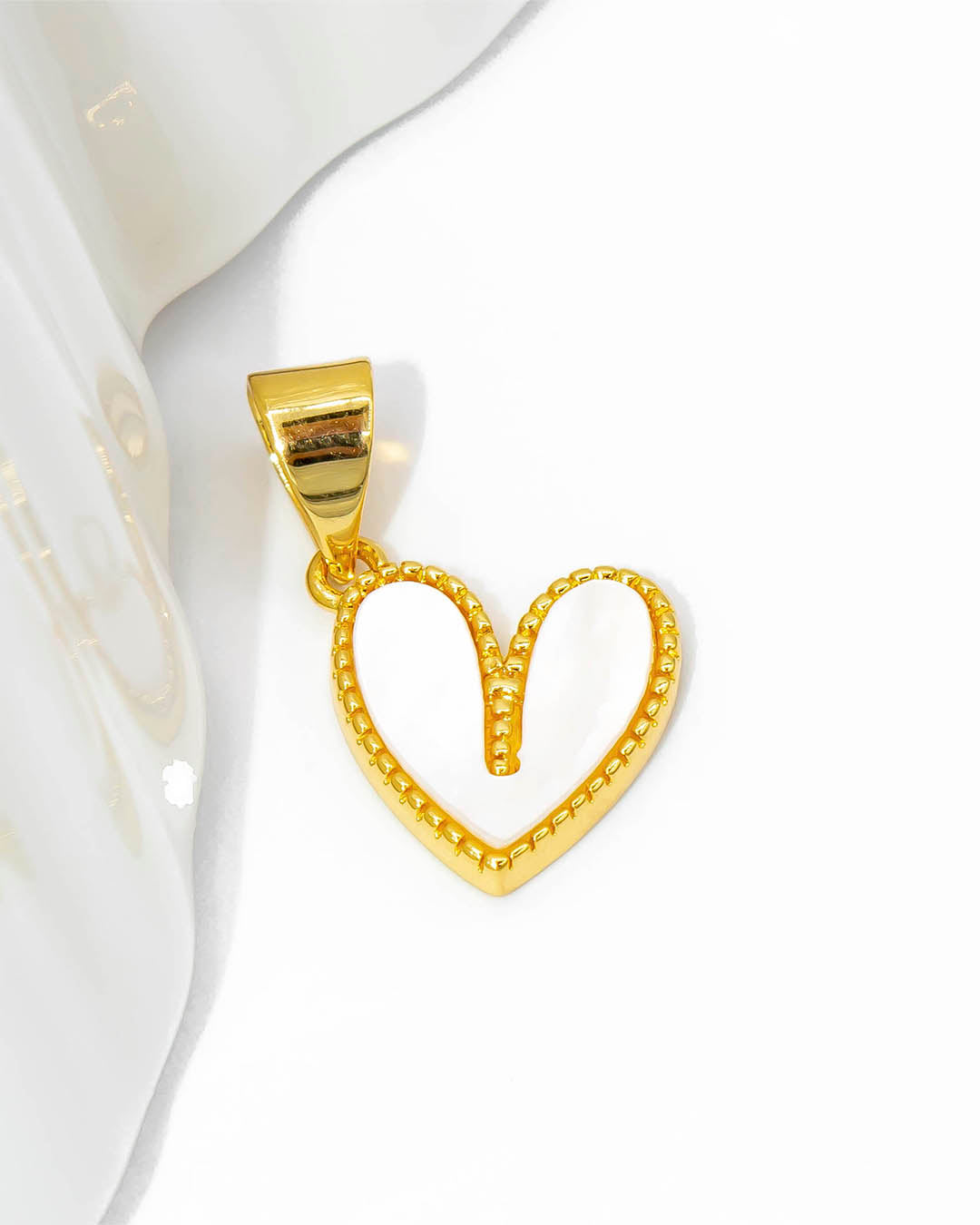 Dije corazón nácar