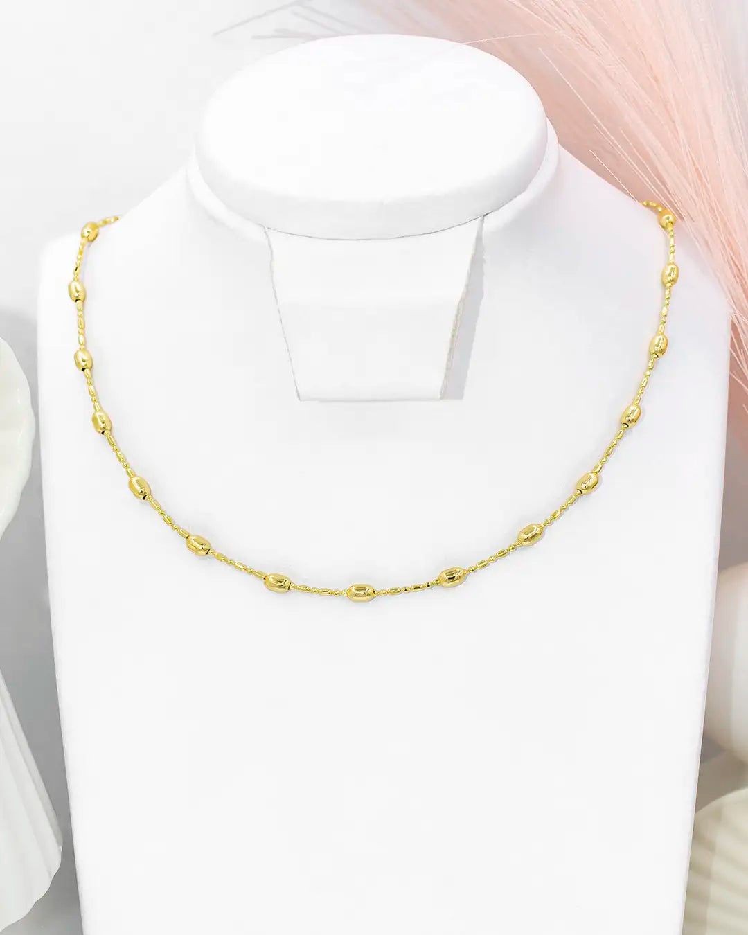 Cadena bolita palito