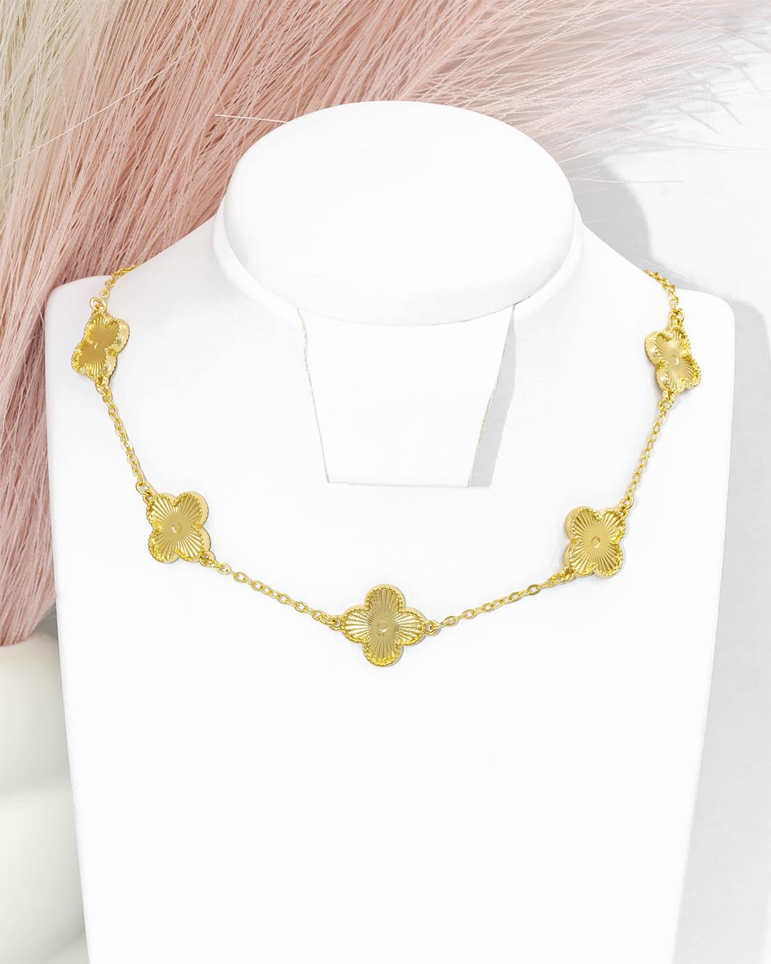 Cadena trébol dorada