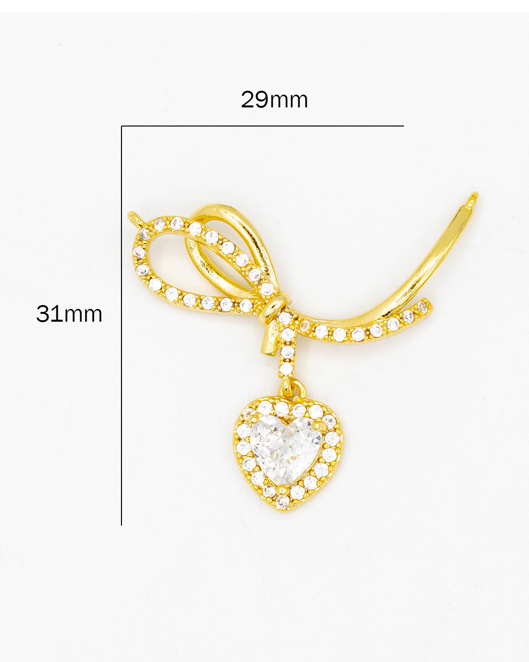 Dije moño con corazón