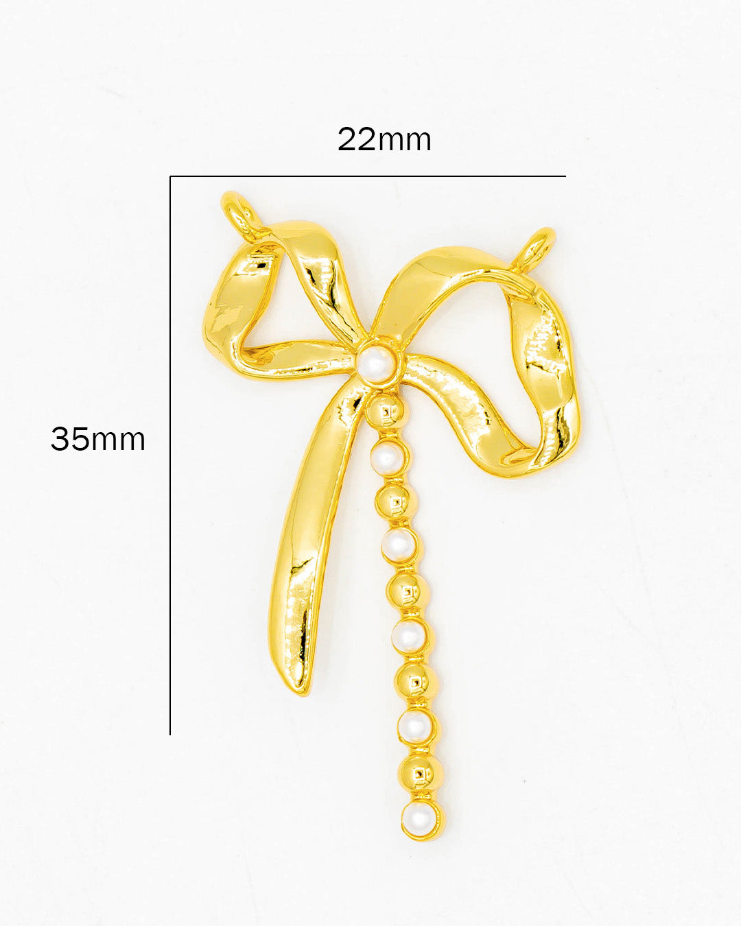 Dije moño doble argolla