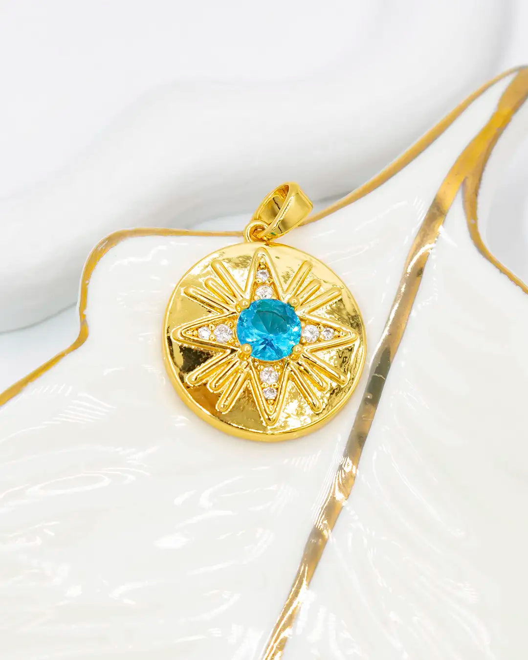 Dije estrella azul