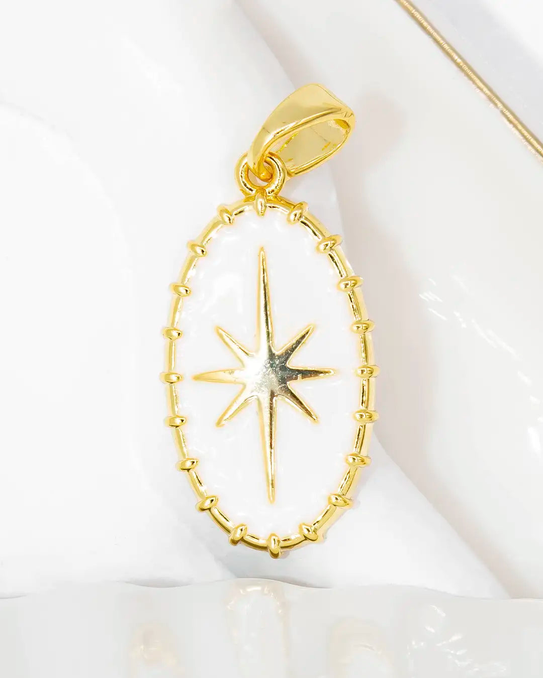 Dije estrella blanca