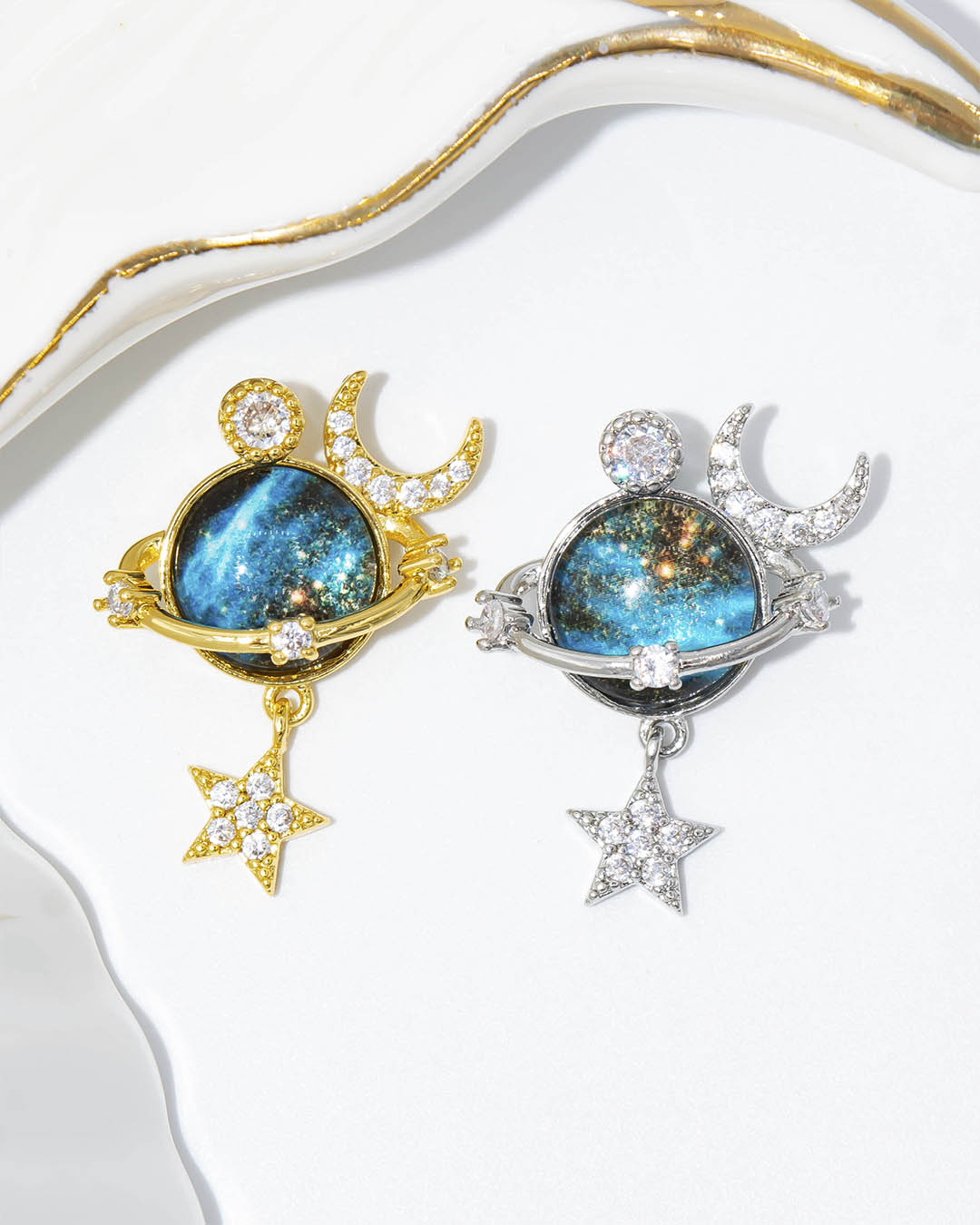 Dije saturno luna y estrella