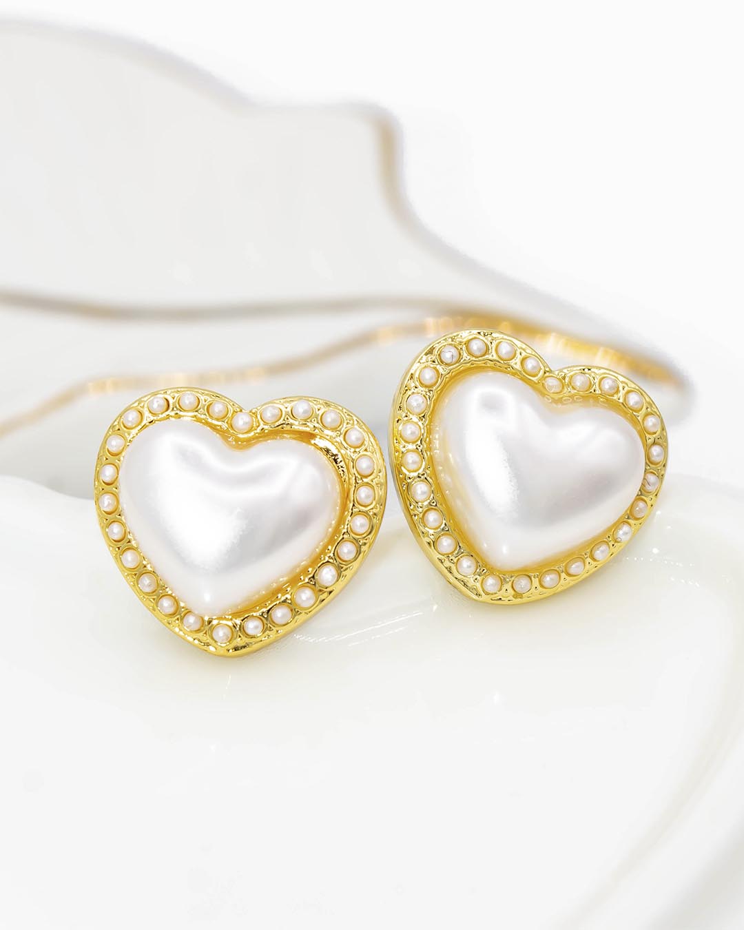 Topo corazón perla