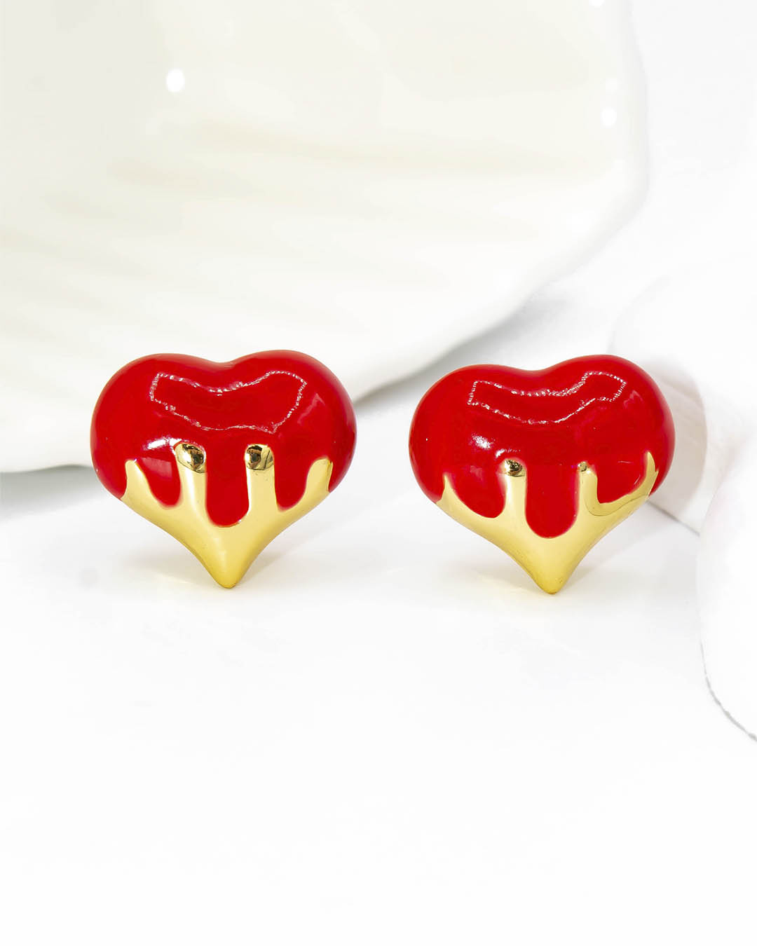 Topo corazón chorreado rojo