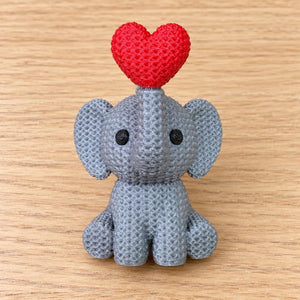 Dije de plástico elefante